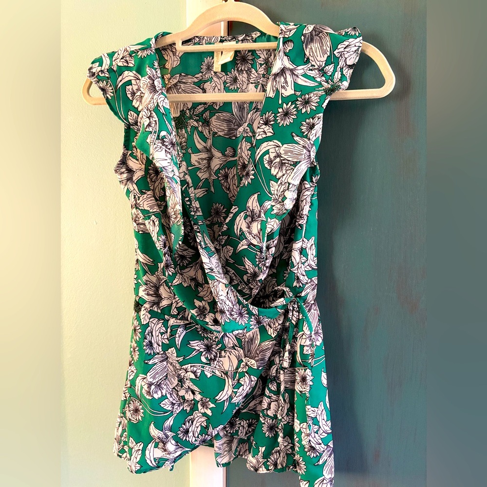 Sleeveless, wrap blouse
